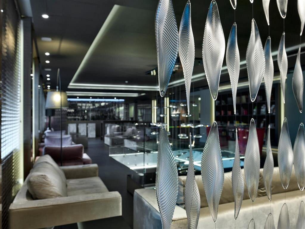 Hotel Ambasciatori — area comune sala lettura c-hotels Firenze